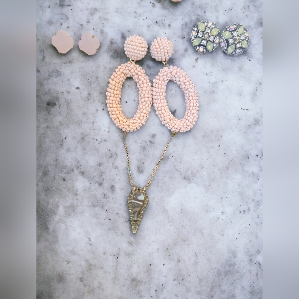 Beautiful bundle of 3 pairs of earrings and one arrowhead pendant necklace.